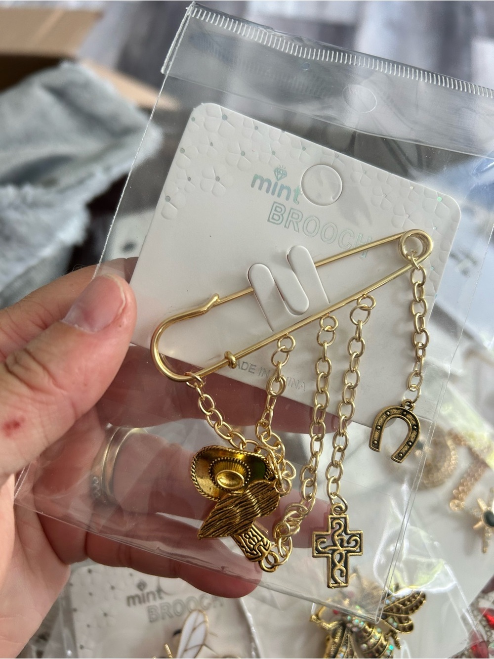 4/$50 Mint Gold-tone Charm Safety Pin Brooch with Cross, Horseshoe & Cowboy Hat